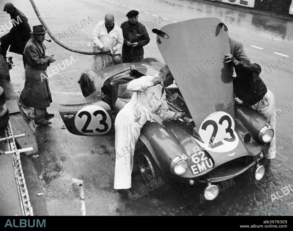 Pit stop, Le Mans 24 Hours, France, 1955. The Aston Martin DB3S of Peter Collins and Paul Frere being worked on and refuelled. The car finished the race in second place behind the Jaguar of Mike Hawthorn and Ivor Bueb.