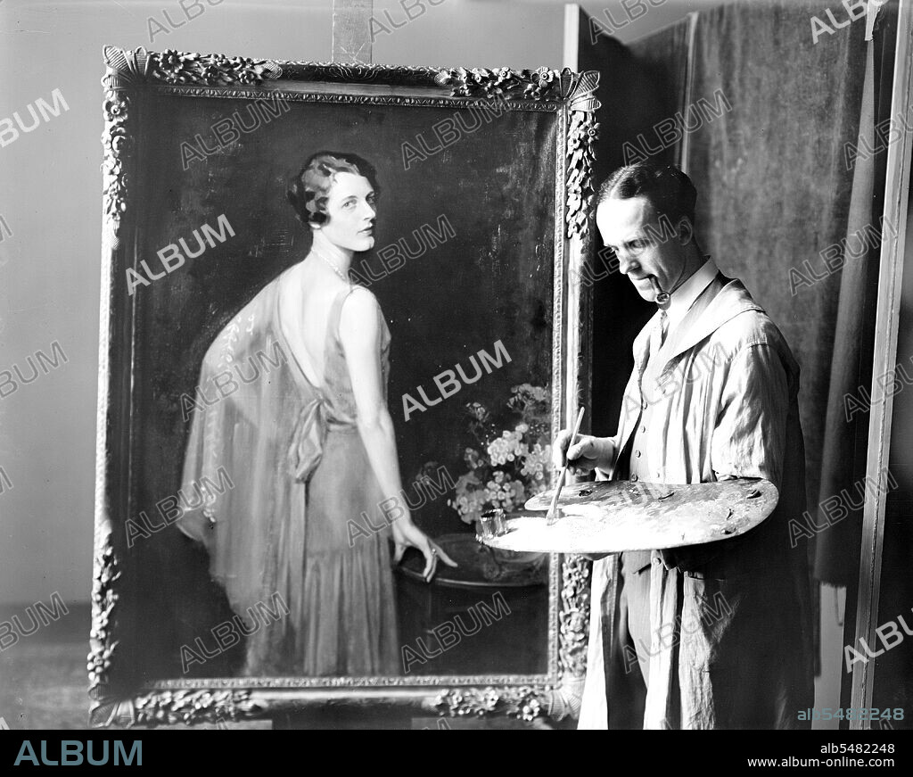 Artist Douglas Chandor painting in studio circa early 1900s.