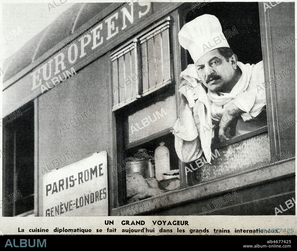 'Un grand voyageur : la cuisine diplomatique se fait aujourd'hui dans les grands trains internationaux'. Photomontage representant Pierre LAVAL (1883-1945) en cuisinier lors de son voyage diplomatique en Italie fasciste, publie dans Marianne du 16/01/1935. Credit : Collection KHARBINE-TAPABOR.
