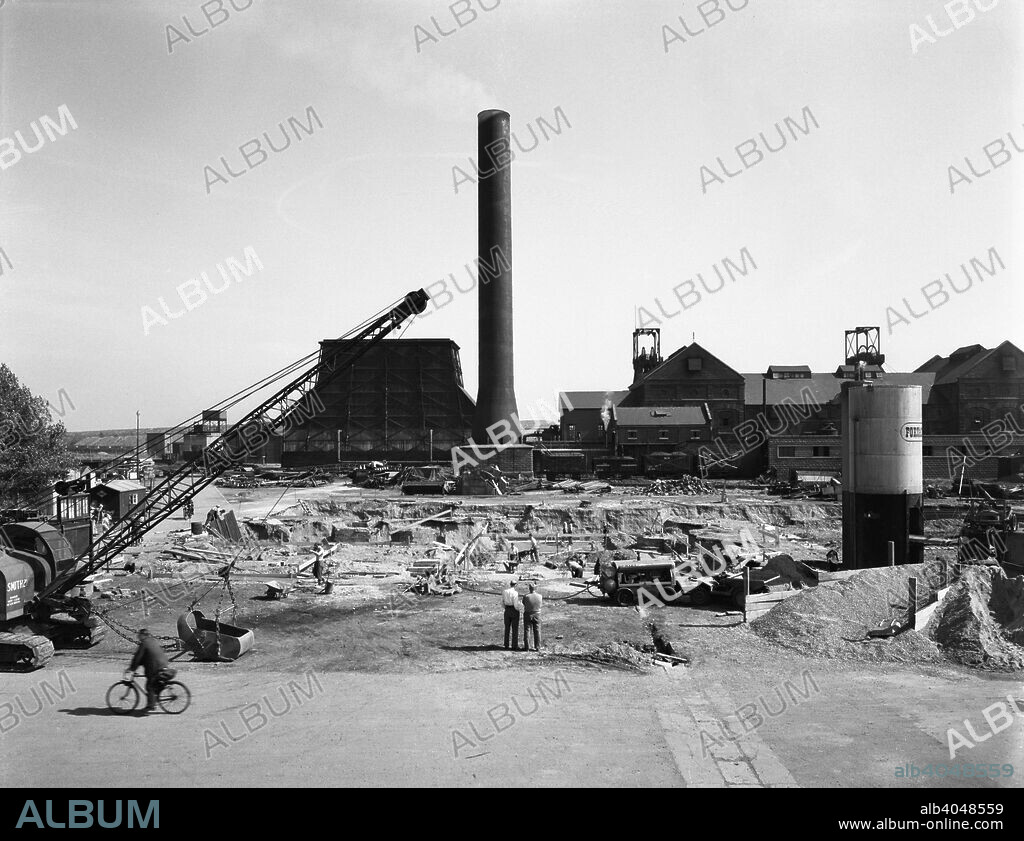 Markham Main Colliery, Armthorpe, near Doncaster, South Yorkshire, 1961. A general view of the colliery taken during refurbishment work in 1961. During the Miners' Strike in the early 1980s, there were violent clashes between strikers and police and the 'Battle of Markham Main' is a reminder of more unsettled times. The site became home to a smart new housing development after the pit closed in 1996.