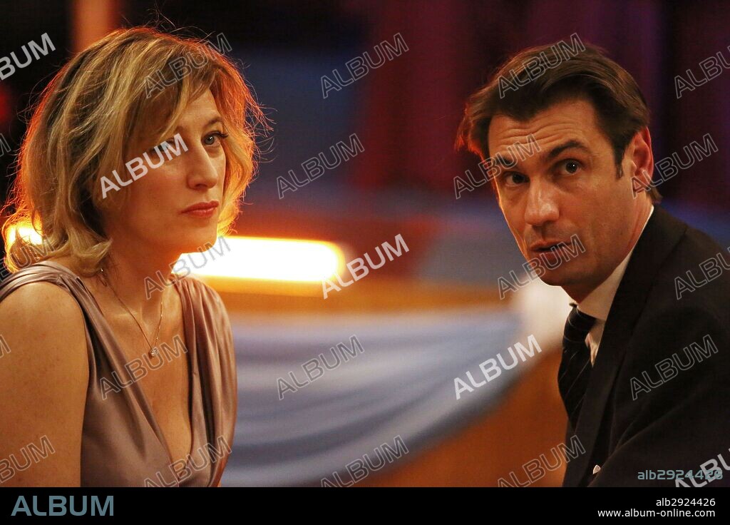 FABRIZIO BENTIVOGLIO and VALERIA BRUNI TEDESCHI in HUMAN CAPITAL, 2013 (IL CAPITALE UMANO), directed by PAOLO VIRZI. Copyright INDIANA PRODUCTION COMPANY.