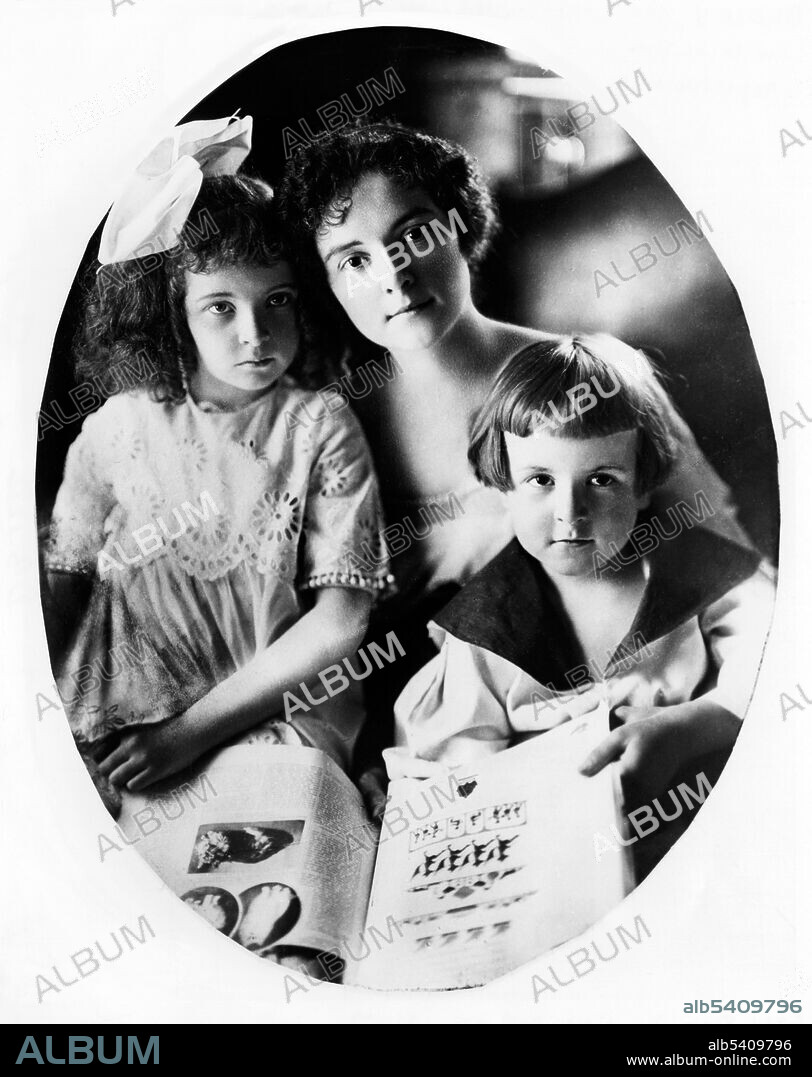 Dudley with her children, Guilford Dudley, Jr. and Trevania Dallas Dudley. This photograph was widely circulated with suffrage publicity materials in an effort to counteract stereotypes of suffragists as mannish radicals. Anne Dallas Dudley (November 13, 1876 - September 13, 1955) was an American suffragette and temperance advocate. She was also worked for the American Red Cross during WWII. Through her work in the temperance movement she became convinced that women's place in society could only be improved if women were allowed to vote. As Third Vice President of the National American Woman Suffrage Association, she helped lead efforts to get the 19th Amendment ratified. Following the success of the suffrage campaign, Dudley became the first woman selected as the delegate-at-large to the Democratic National Convention in 1920.  Tennessee State Library and Archives, 1929.