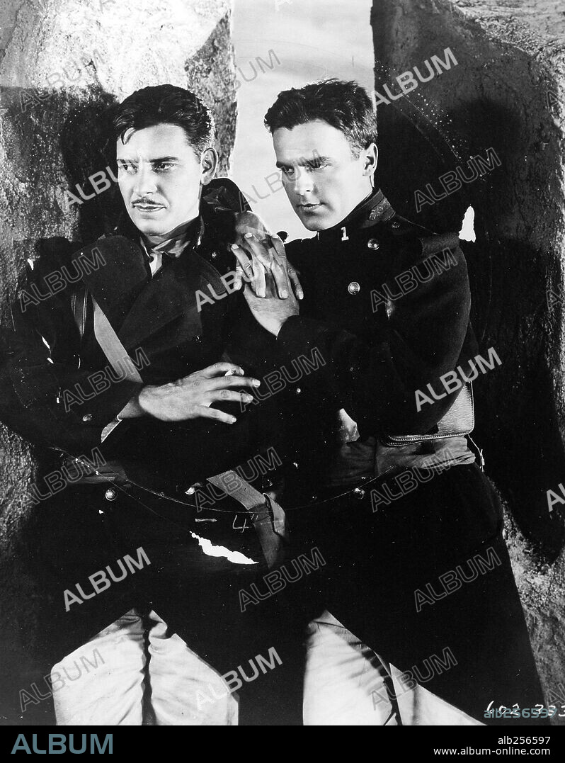 NEIL HAMILTON and RONALD COLMAN in BEAU GESTE, 1926, directed by HERBERT BRENON. Copyright PARAMOUNT PICTURES.