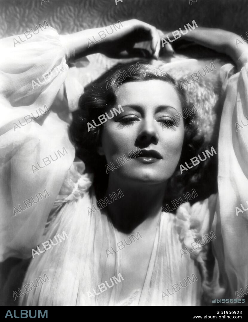 IRENE DUNNE.
