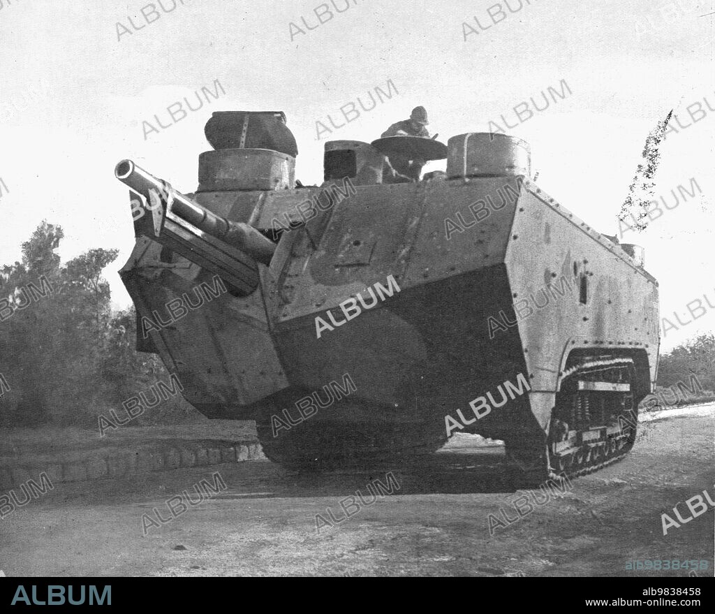 'Sur le massif de Moronvilliers; Notre artillerie d'assaut: char armé a l'avant d'un canon..., 1917. First World War: on the Moronvilliers Hills; assault artillery, armoured vehicle with cannon. From "L'Album de la Guerre 1914-1919, Volume 2" [L'Illustration, Paris, 1924].