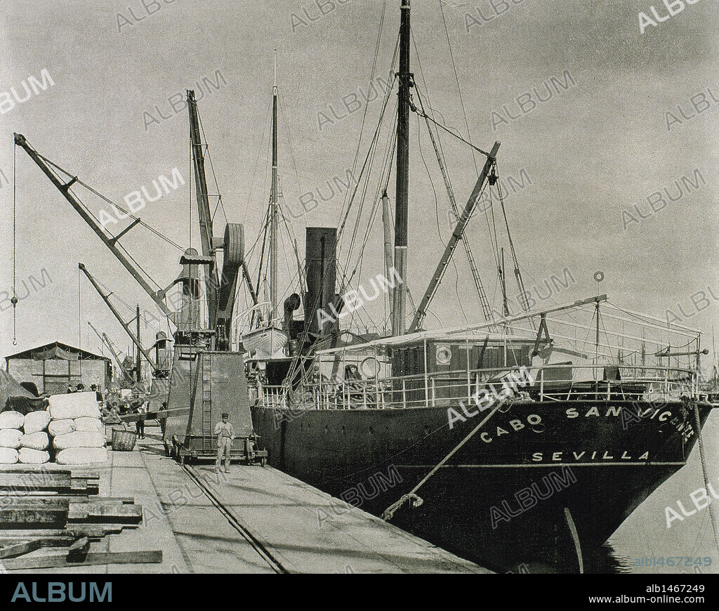 Barcos y grúas en los muelles del Puerto de Barcelona. Finales del s. XIX. Cataluña.