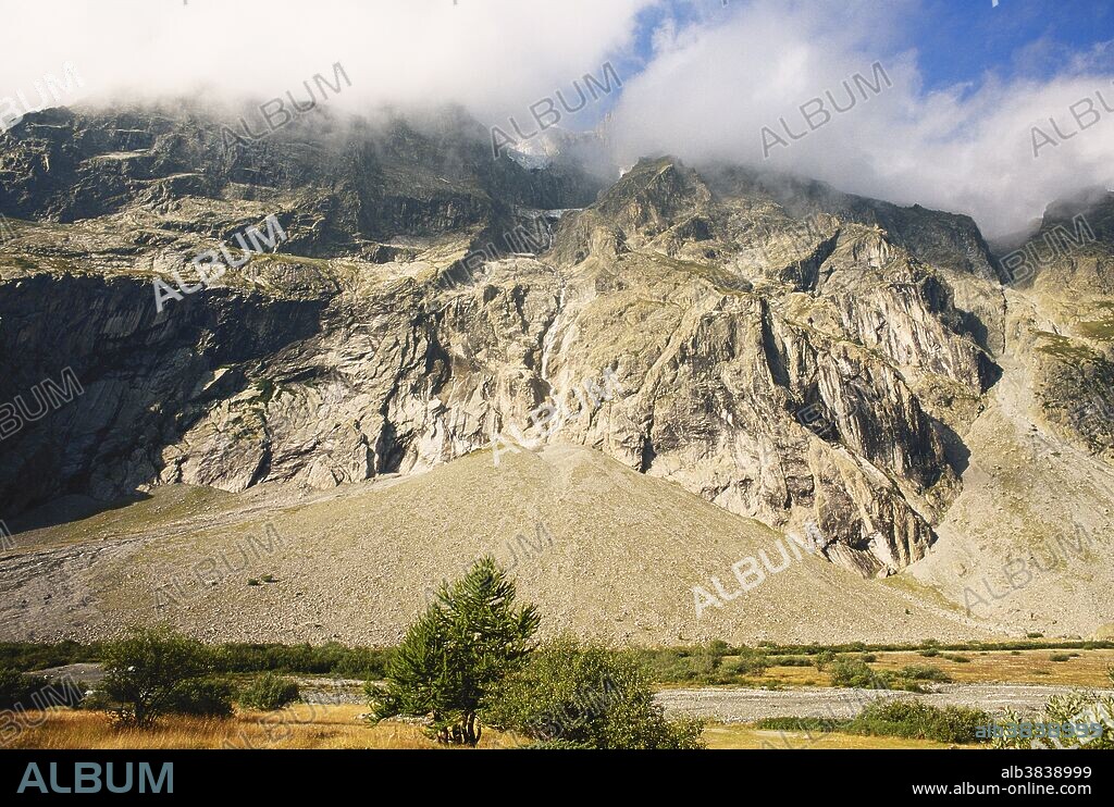 High rocky ramparts and talus or scree slopes produced by successive rock falls typical of a steeply sloping rock face, particularly where frost weathering occurs.  Blanc Glacier, southern French Alps, France.