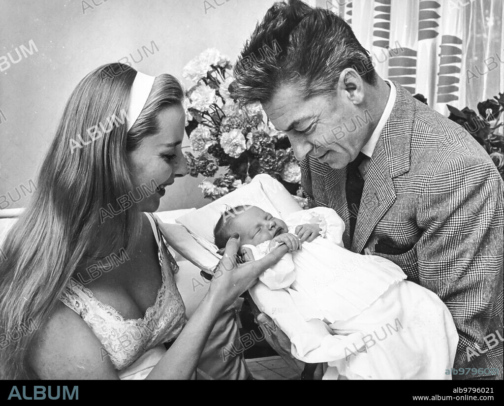 Herbert von karajan with his wife eliette and their first child, 1960.