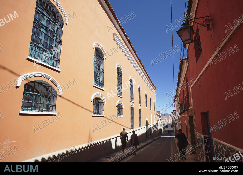 People walking along street, Potosi, UNESCO World Heritage Site, Bolivia, South America.