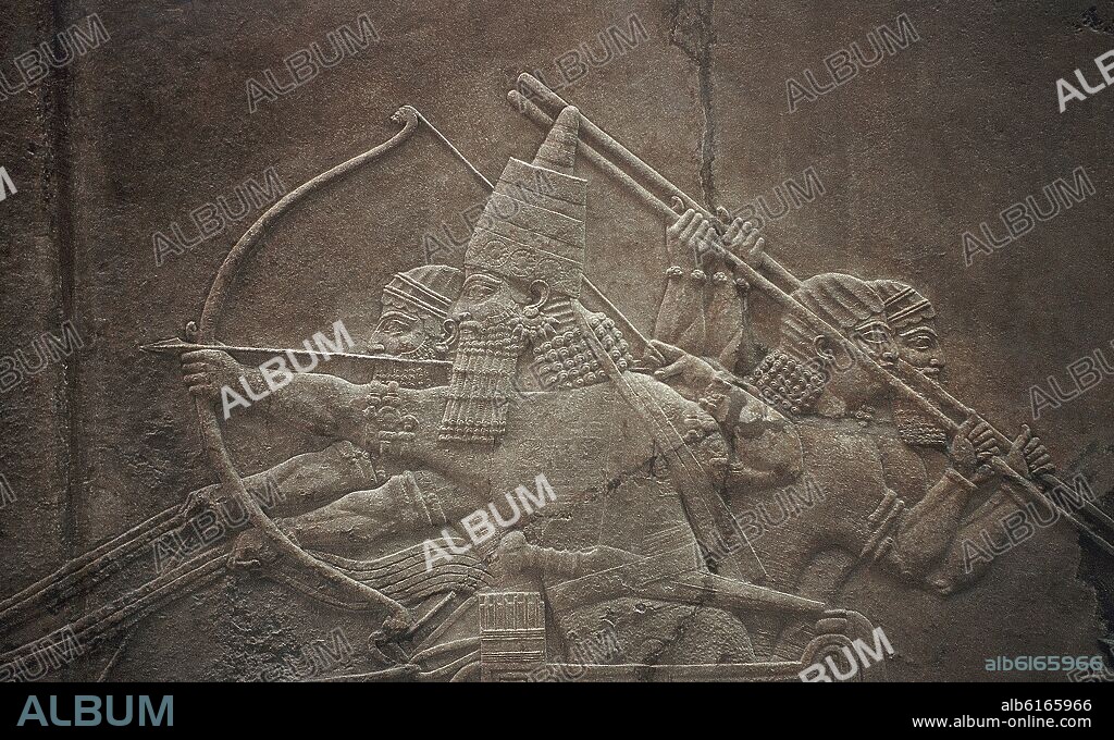 EL REY CAZANDO - RELIEVE DEL PALACIO DE NINIVE - SIGLO VII AC.