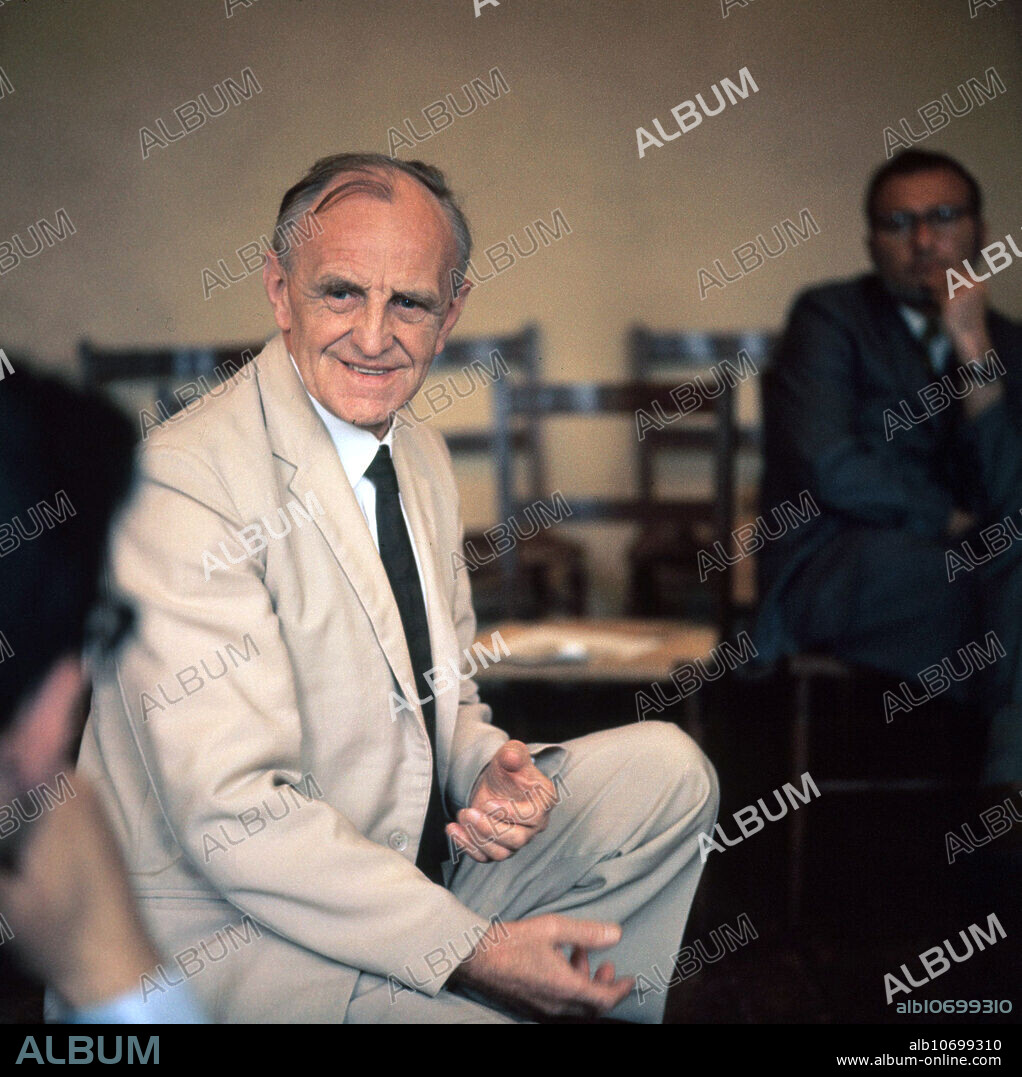 Editorial use only . Dr. Donald Woods Winnicott (1896-1971) British psychoanalyst, paediatrician, and child psychiatrist. He worked at the Paddington Green Children's Hospital, London, UK, for over 40 years, beginning in 1923, where he became interested in child psychoanalysis. Winnicott's treatment of psychically disturbed children and their mothers gave him the experience on which he built his most influential concepts, such as the "holding environment" and the "transitional object," known to every parent as the "security blanket." He had a major impact on object relations theory, particularly in his 1951 essay "Transitional Objects and Transitional Phenomena," which focused on familiar, inanimate objects that children use to stave off anxiety during times of stress. Photographed in 1963 in London, UK.