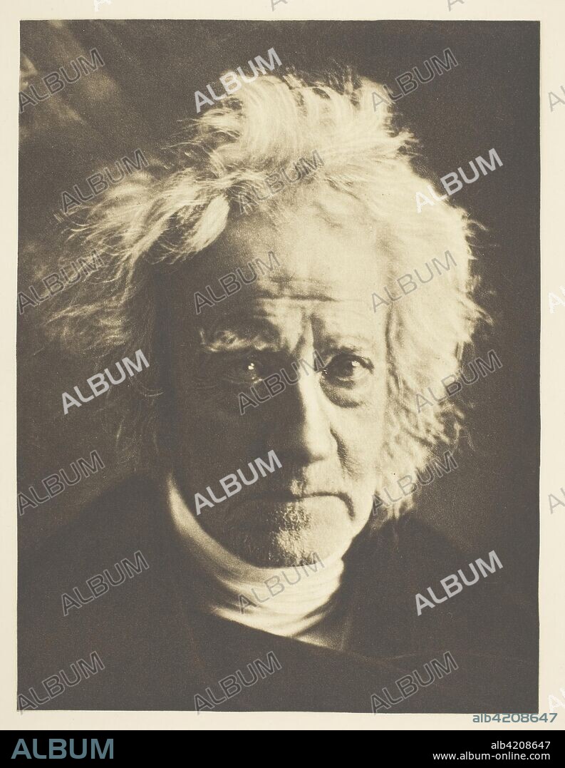 Sir John Herschel. Julia Margaret Cameron; English, 1815-1879. Date: 1867. Dimensions: 21.4 × 16.1 cm (image); 38.2 × 28.3 cm (paper). Photogravure, from "Sun Artists, Number 5" (1890). Origin: England.
