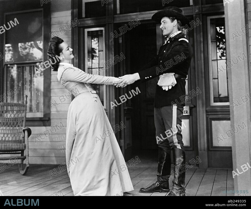 ERROL FLYNN und OLIVIA DE HAVILLAND in THEY DIED WITH THEIR BOOTS ON, 1941, unter der Regie von RAOUL WALSH. Copyright WARNER BROTHERS.