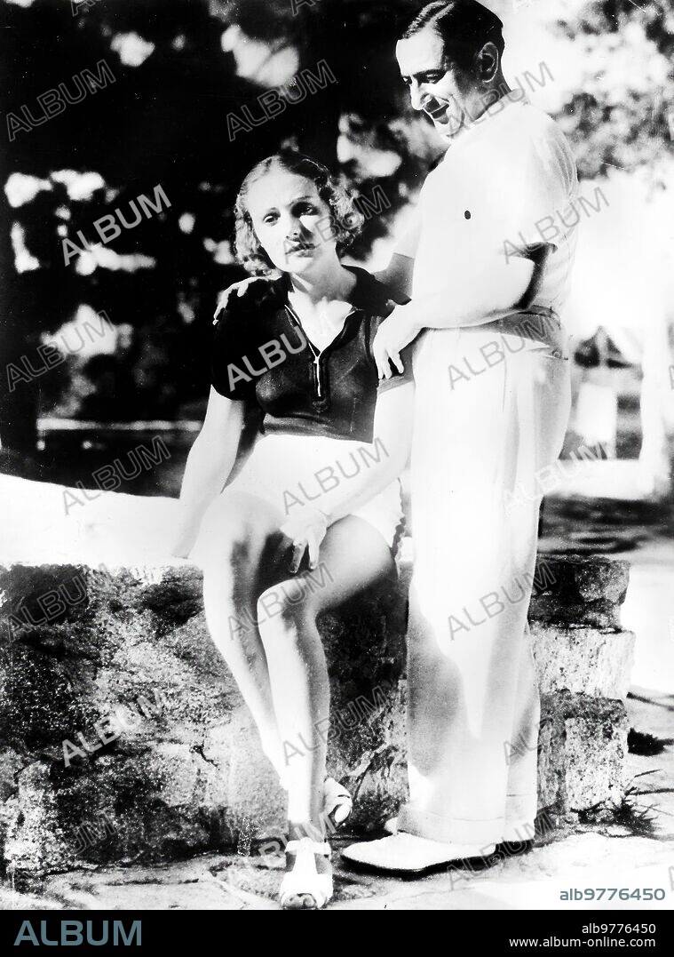 1935. Film director Ernst Lubitsch and his wife Vivian Gaye.