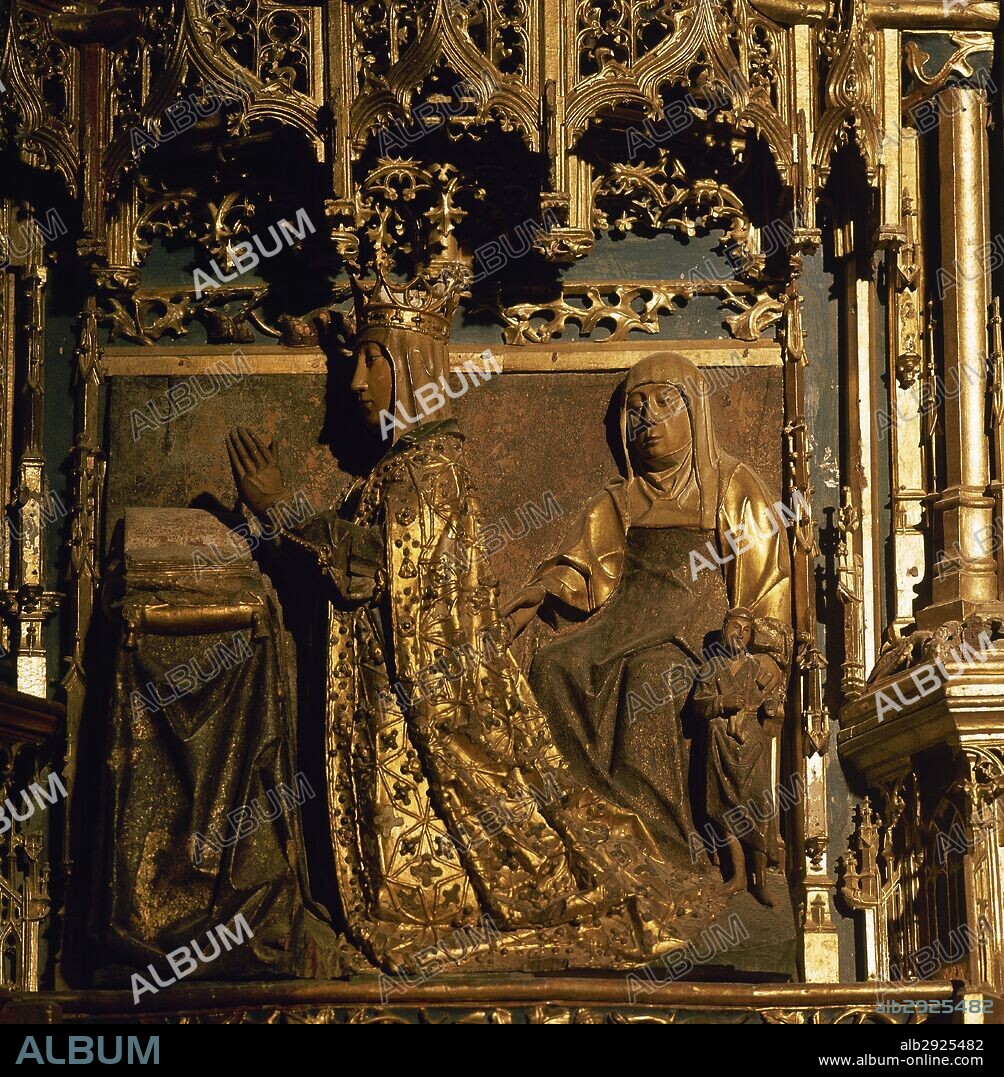 Spain. Castile and Leon. Burgos. MIraflores Charterhouse. Altarpiece which  was carved in 1496-1499 by Castilian sculptor of Flemish origin Gil de Siloe (1440-1501), and polychromed and gilded by Diego de la Cruz (1482-1500), a Flemish origin painter.  Detail of Isabel of Portugal, queen consort of Castile, 1447-1454, praying and protected by her patron Saint ( St. Elizabeth).