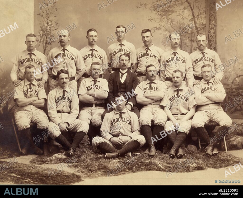 Brooklyn base ball team, 1889; Brooklyn Bridegrooms baseball team in 1889, posed are: manager Bill McGunnigle, players George J. "Germany" Smith, George B. Pinckney, John Stewart "Pop" Corkhill, Robert Lee Caruthers, William H. "Adonis" Terry, Hubert B. "Hub" Collins, David L. Foutz, Michael J. "Mickey" Hughes, William D. "Darby" O'Brien, Thomas "Oyster" Burns, Albert "Doc" Bushong, Robert H. Clark, Joseph P. Visner, and Thomas Joseph Lovett.