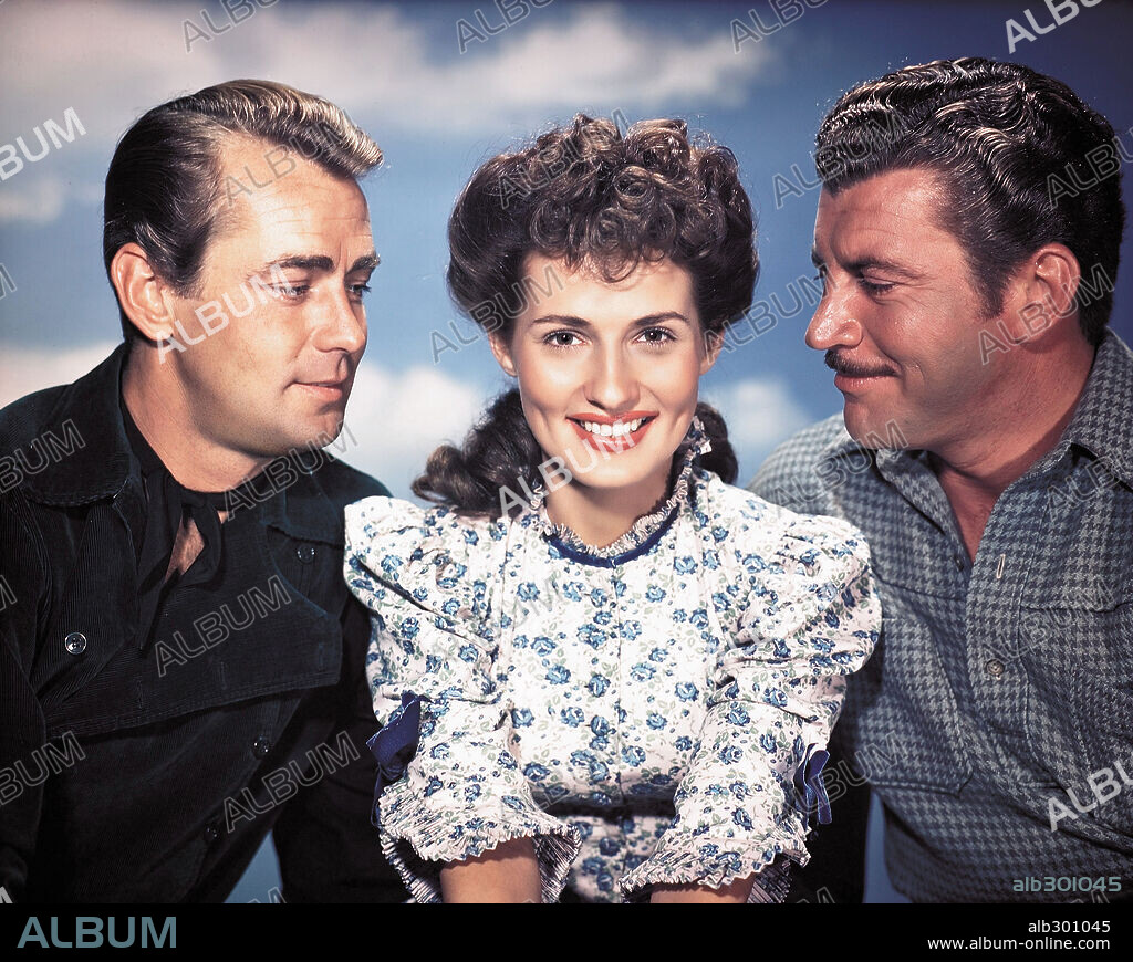 ALAN LADD, BRENDA MARSHALL and ROBERT PRESTON in WHISPERING SMITH, 1948, directed by LESLIE FENTON. Copyright PARAMOUNT PICTURES.