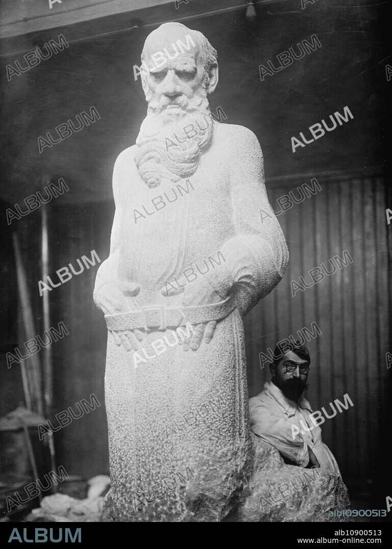 BAIN NEWS SERVICE. Serge Mercouroff and "Tolstoi", between c1910 and c1915. Shows Russian sculptor Sergei Dmitrievich Merkurov (1881-1952) working on his statue of Leo Tolstoy.