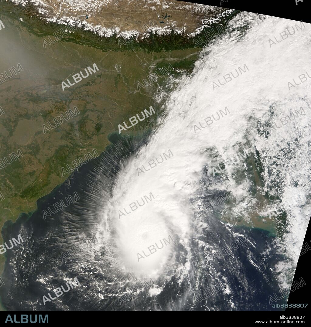 Tropical Cyclone Sidr was continuing its northward progress over the Bay of Bengal on November 14, 2007. It was moving north toward the Mouths of the Ganges at a speed of 13 kilometers per hour (8 miles per hour), and winds in the storm system were raging at 220 km/hr (140 mph) near the storm's center, making it a Category 4 strength tropical cyclone. The Moderate Resolution Imaging Spectroradiometer (MODIS) on NASA's Terra satellite acquired this photo-like image at 10:15 a.m. local time (4:45 UTC) on November 14, 2007. Tropical Cyclone Sidr appears here as a well-developed and distinct ball of circling clouds; the storm has a distinct but cloudy eye at its center. An extended arm of clouds reaches northward from the storm across Bangladesh, bringing the influence of the storm onshore already even though it was hundreds of kilometers to the south. Western Bangladesh, where the storm appeared to be headed as of November 15, is the most heavily populated low-lying area in the world, with a history of severe causalities from previous storms due to both direct flooding and storm surge. The Joint Typhoon Warning Center was predicting that the storm would weaken, but still make landfall with hurricane-force winds. In 1970, a Category 3 storm that made landfall in the same vicinity caused 300,000 deaths and was one of the most deadly natural disasters in modern history. Another 138,000 people perished in 1991 from another such cyclone.