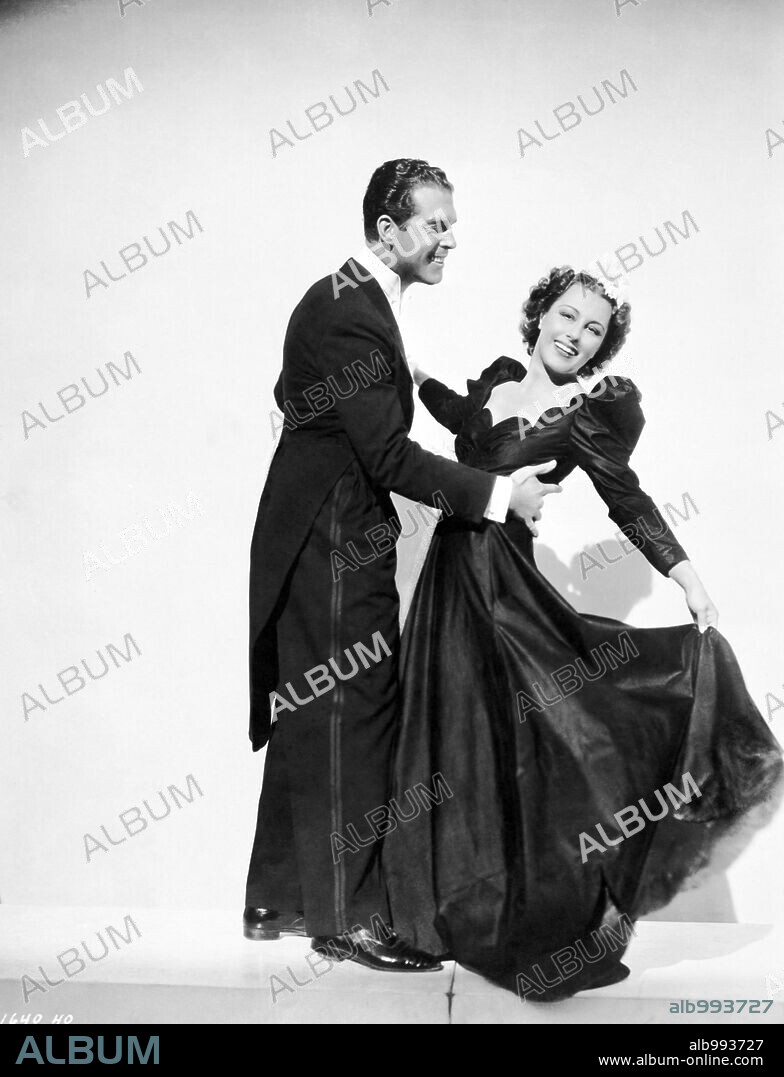 FRED MACMURRAY and GLADYS SWARTHOUT in CHAMPAGNE WALTZ, 1937, directed by A. EDWARD SUTHERLAND. Copyright PARAMOUNT PICTURES.