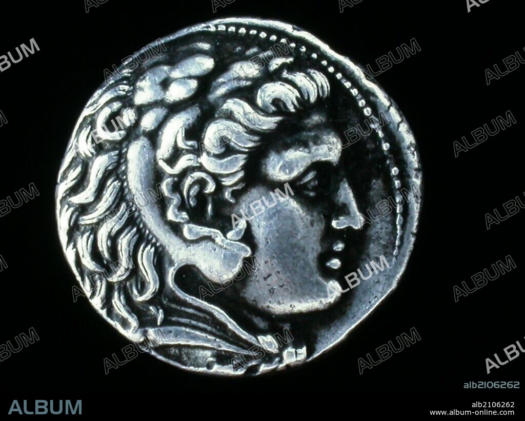 NUMISMATICA. MONEDA GRIEGA: TETRADRACMA DE PLATA, ANVERSO. CABEZA DE HERCULES JOVEN, CON LA PIEL DE LEON EN LA CABEZA A LA DERECHA. 1ª DECADA DEL SIGLO III A. C. (DEPOSITO: MUSEO ARQUEOLOGICO NACIONAL).
