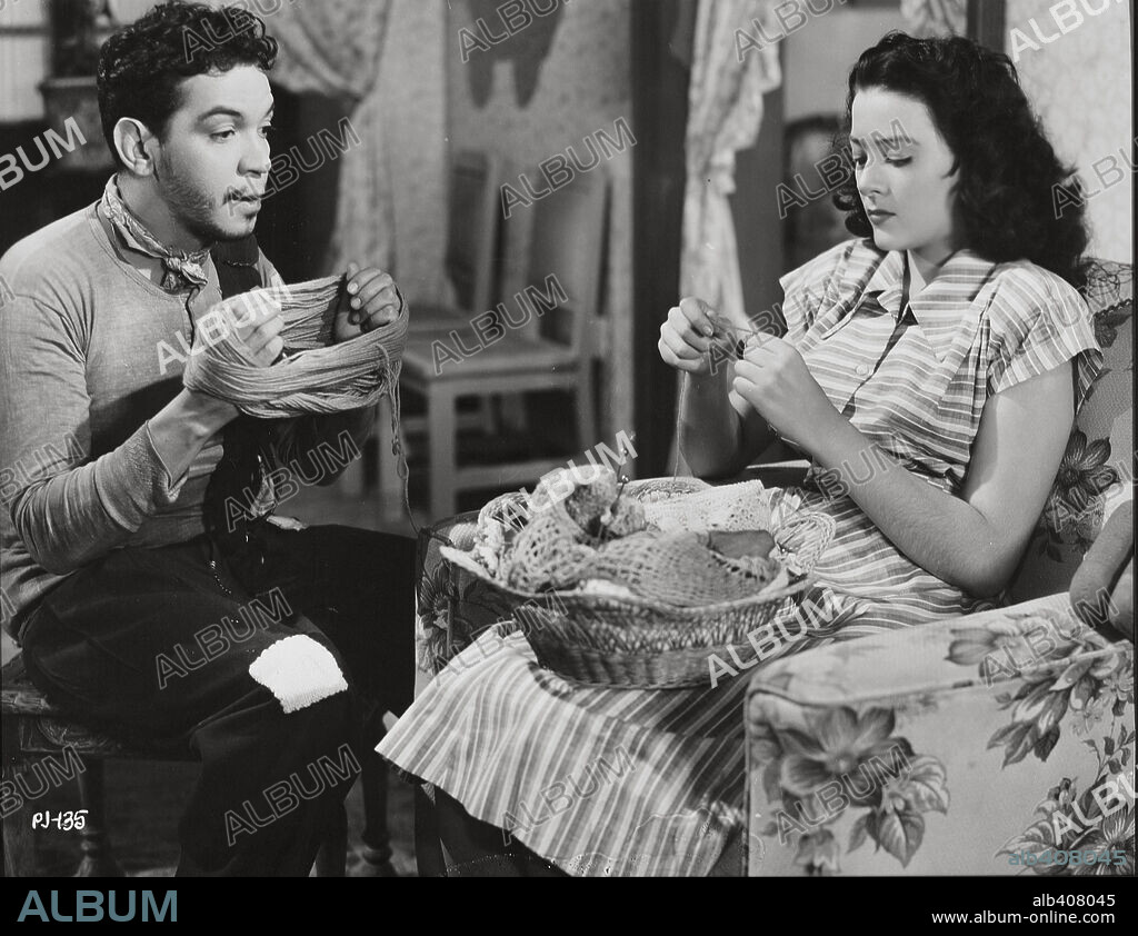 CANTINFLAS en EL PORTERO, 1950, dirigida por MIGUEL M. DELGADO. Copyright POSA FILMS, S.A.
