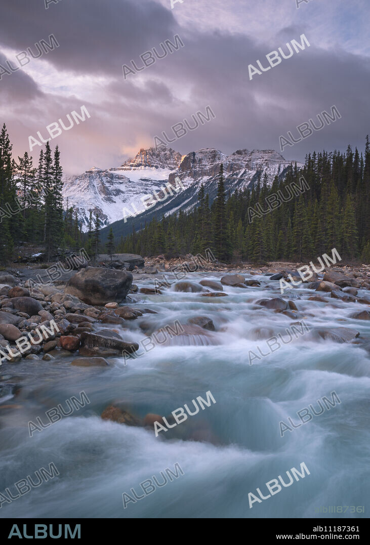 Sunrise and glacial blue rushing waters at Mistaya Canyon, Banff National Park, UNESCO World Heritage Site, Alberta, The Rockies, Canada, North America.