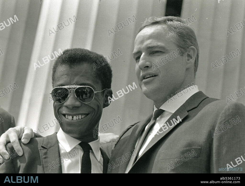 Baldwin and Brando on the steps of the Lincoln Memorial at the March on Washington, 8/28/63. Credit: Rowland Scherman/GG Vintage Images/UIG.
