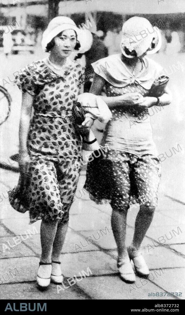 Modern girls ('modan gaaru', also shortened to 'moga') were Japanese women who followed Westernized fashions and lifestyles in the 1920s. These moga were Japan's equivalent of America's flappers, India's kallege ladki, Germany's neue Frauen, France's garconnes, or China's modeng xiaojie.<br/><br/>. The period was characterized by the emergence of working class young women with access to money and consumer goods. Modern girls were depicted as living in the cities, being financially and emotionally independent and choosing their own suitors.