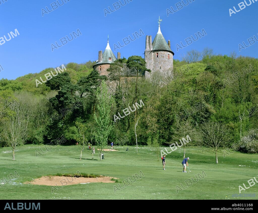 Golf course and Castell Coch, Tongwynlais, near Cardiff, Wales. Castell Coch (Red Castle) is a 19th century Gothic Revival castle built on the site of an earlier fortification dating from the 13th century.