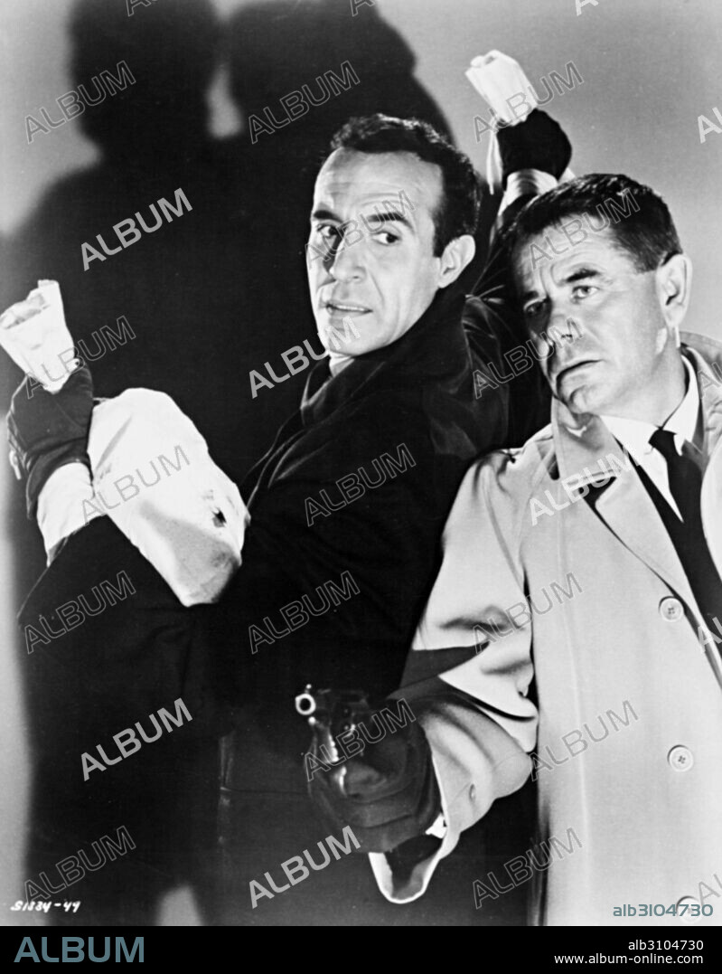 GLENN FORD and RICARDO MONTALBAN in THE MONEY TRAP, 1965, directed by BURT KENNEDY. Copyright M.G.M.