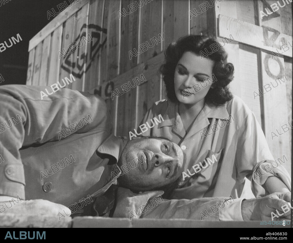 GREGOIRE ASLAN and PATRICIA MEDINA in MISTER ARKADIN, 1955 (MR. ARKADIN), directed by ORSON WELLES. Copyright MERCURY/CERVANTES FILMS/FILMORSA.