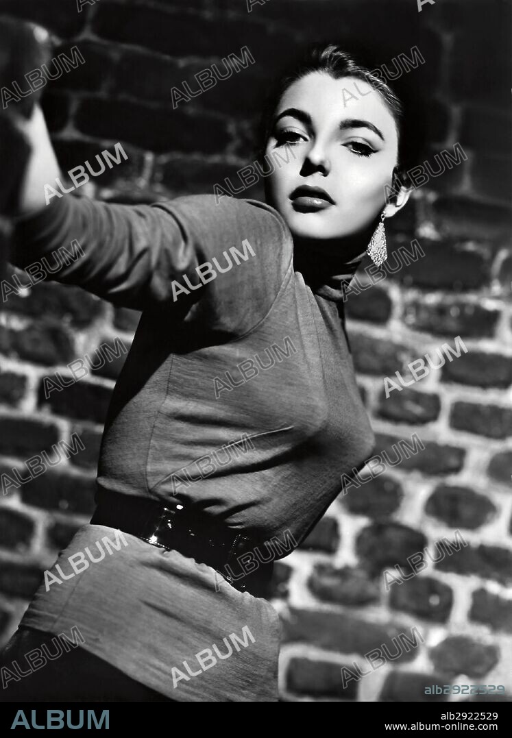 JOAN COLLINS in TURN THE KEY SOFTLY, 1953. Copyright RANK.