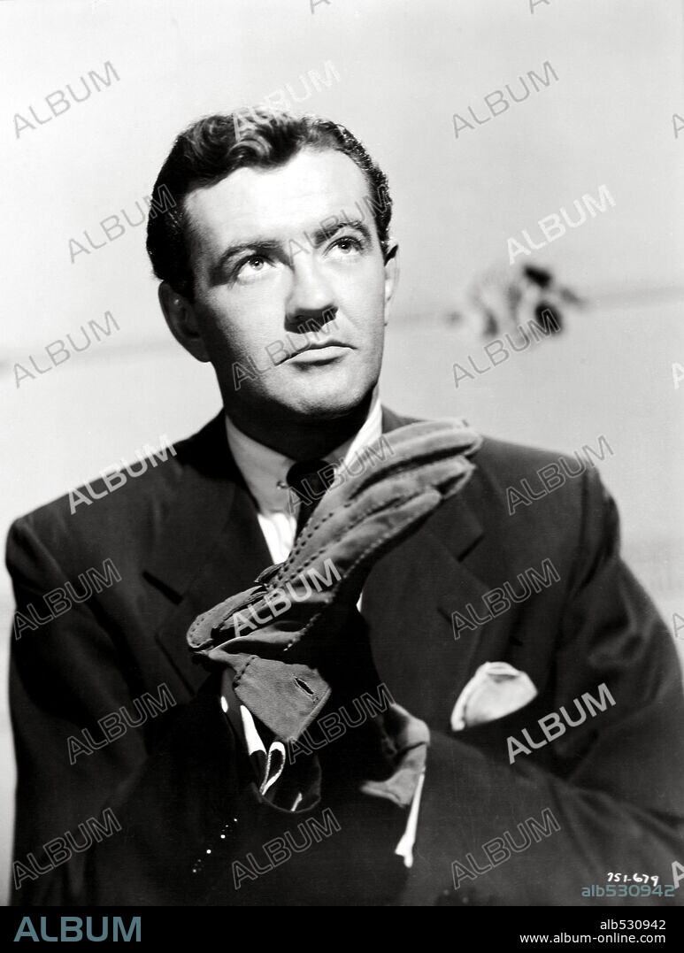 ROBERT WALKER in STRANGERS ON A TRAIN, 1951, directed by ALFRED HITCHCOCK. Copyright WARNER BROTHERS.