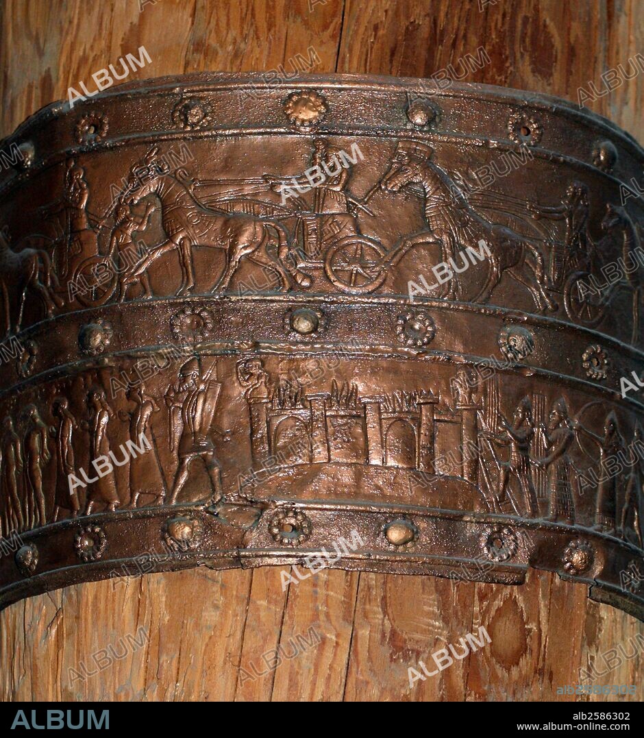 Full scale reconstruction of the gates from the palace of Shalmaneser III (585-824 BC) at Balawat. It is made of cedarwood and fitted with electrotype copies of the original bronze bands.