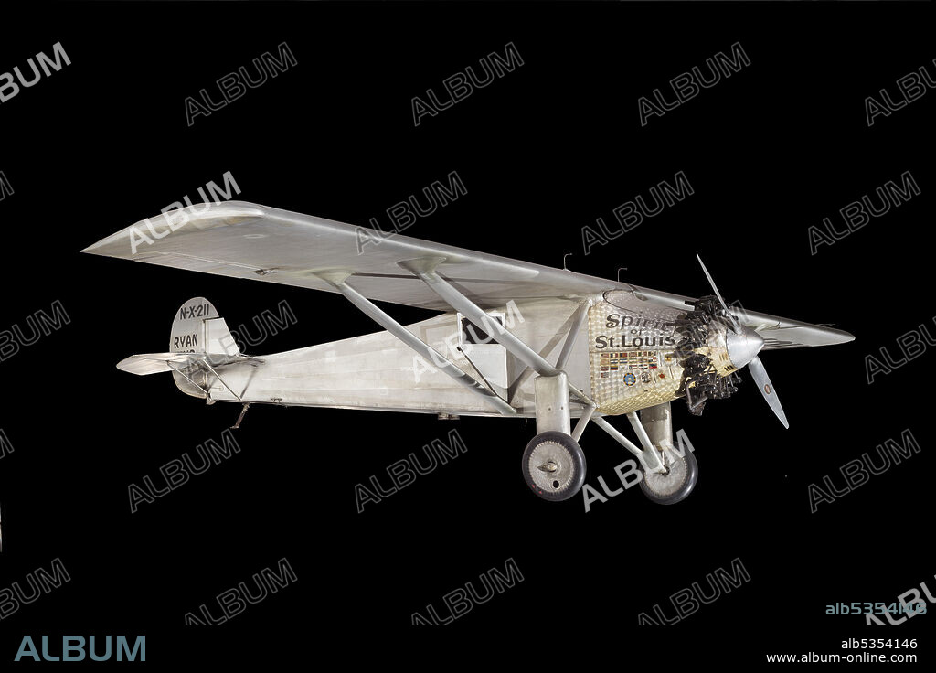 RYAN AIRCRAFT CO.. Monoplane flown by Charles Lindbergh on May 20-21 1927 on the first solo nonstop transatlantic flight. Silver colored doped fabric covered high wing single radial engine monoplane. The "Spirit of St. Louis" was designed by Donald Hall under the direct supervision of Charles Lindbergh. It is a highly modified version of a conventional Ryan M-2 strut-braced monoplane, powered by a reliable 223hp Wright J-5C engine. Because the fuel tanks were located ahead of the cockpit for safety in case of an accident, Lindbergh could not see directly ahead, except by using a periscope on the left side or by turning the airplane and looking out a side window. The two tubes beneath the fuselage are flare dispensers that were installed for Lindbergh's flights to Latin America and the Caribbean.