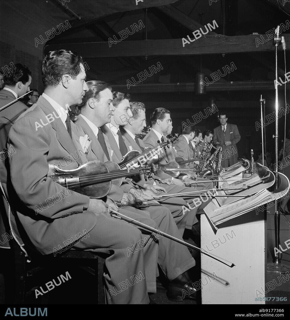 WILLIAM PAUL GOTTLIEB. Portrait of Bill Cogliano, Joseph Kowalewski, Carl Ottobrino, Stanley Kraft, Dick Motzlinski, Manny Thaler, Sol Libero, Mack Pierce, Stanley M. Aronson, Vincent Carbone, and Tex Beneke, New York, N.Y., ca. June 1947.