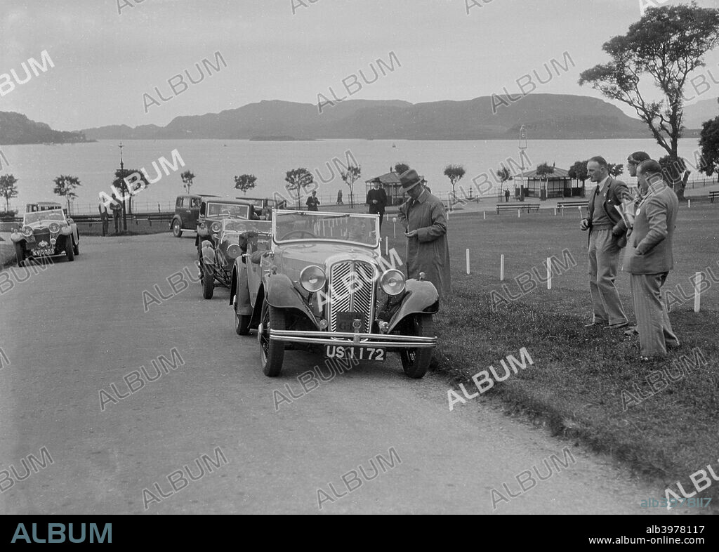 Morris 10 1292 cc. Vehicle Reg. No.  US1172.  Entry No: G19. Driver: Hughes-Onslow, Capt. O. Left: Riley Vehicle Reg. No.  KV5092. R.S.A.C. Scottish Rally. Date: 5-9.6.33.