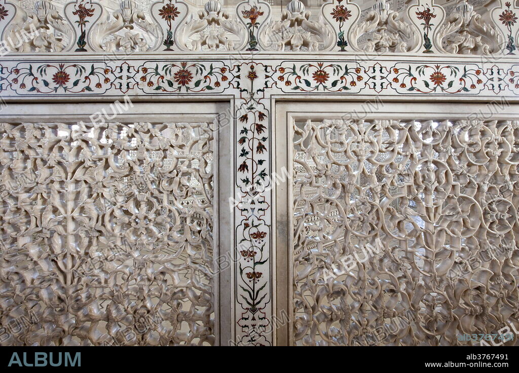 The Taj Mahal mausoleum detail of Pietra Dura jewels inlaid in marble and latticed screens, Uttar Pradesh, India.