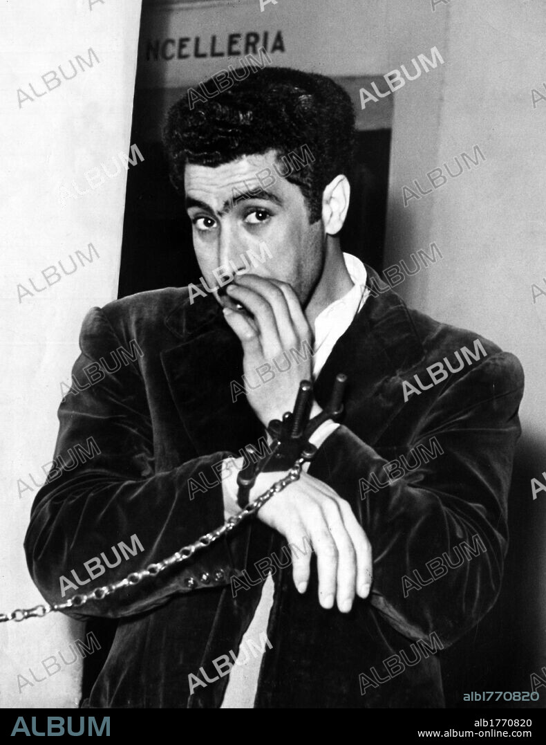 Gaspare Pisciotta in handcuffs. The Sicilian bandit Gaspare Pisciotta in court after being arrested. 1950.