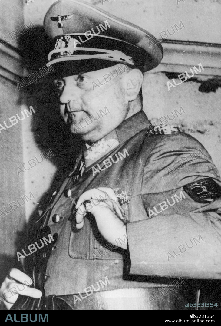 Orig. bildtext... NAZI GENERAL SURRENDERS PARIS. General Dietrich von Choltiz, Nazi Commander in Paris, is shown after he officially surrendered the French capital August 25, 1944, at the Montparnasse station. The staff of the general and 10,000 German soldiers laid down their arms. Anm. CD332 persons: DIETRICH VON CHOLTITZ sites: TYSKLAND*;PARIS;FRANKRIKE.