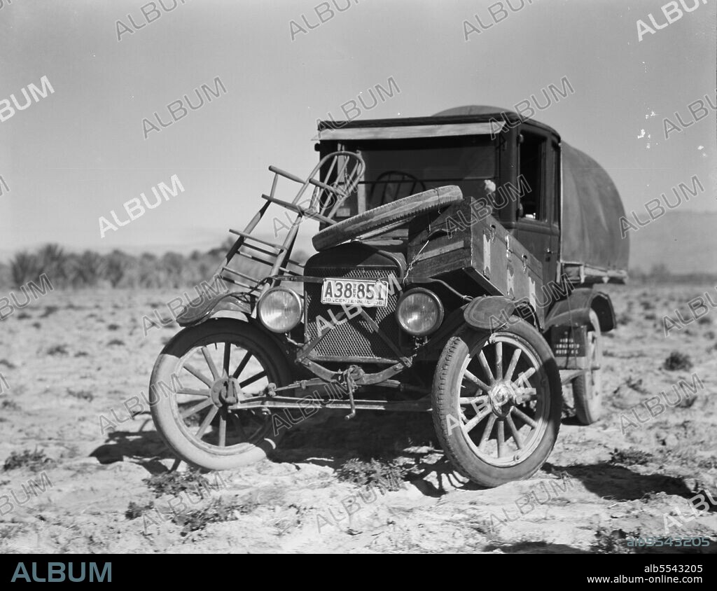 DOROTHEA LANGE. Texan refugees' car. They are seeking work in the carrot fields of the Coachella Valley. California.