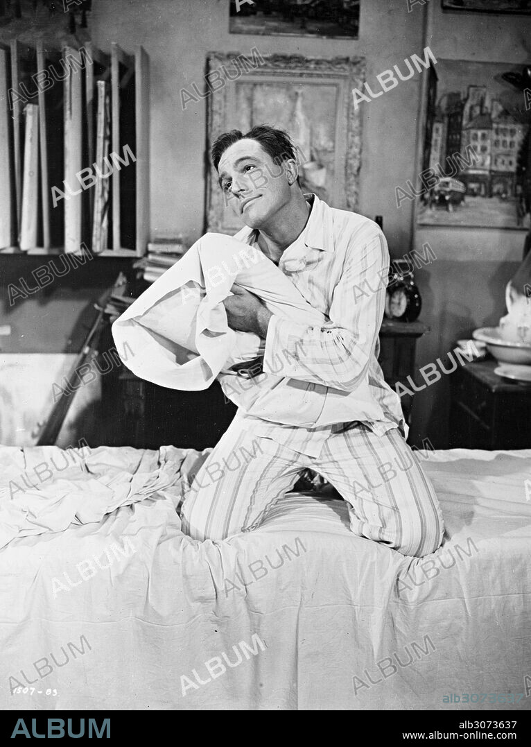 GENE KELLY en UN AMERICANO EN PARÍS, 1951 (AN AMERICAN IN PARIS), dirigida por VINCENTE MINNELLI. Copyright M.G.M.