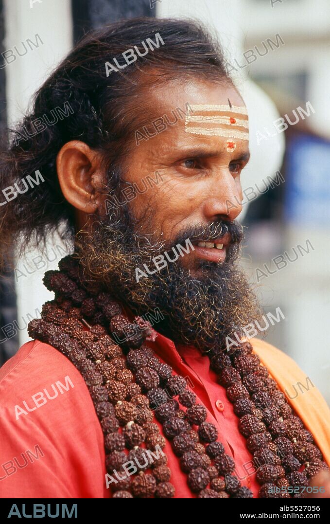 They are known, variously, as sadhus (saints, or 'good ones'), yogis (ascetic practitioners), fakirs (ascetic seeker after the Truth) and sannyasins (wandering mendicants and ascetics). They are the ascetic – and often eccentric – practitioners of an austere form of Hinduism. Sworn to cast off earthly desires, some choose to live as anchorites in the wilderness. Others are of a less retiring disposition, especially in the towns and temples of Nepal's Kathmandu Valley. If the Vale of Kathmandu seems to boast more than its share of sadhus and yogis, this is because of the number and importance of Hindu temples in the region. The most important temple of Vishnu in the valley is Changunarayan, and here the visitor will find many Vaishnavite ascetics. Likewise, the most important temple for followers of Shiva is the temple at Pashupatinath. Vishnu, also known as Narayan, can be identified by his four arms holding a sanka (sea shell), a chakra (round weapon), a gada (stick-like weapon) and a padma (lotus flower). The best-known incarnation of Vishnu is Krishna, and his animal is the mythical Garuda. Shiva is often represented by the lingam, or phallus, as a symbol of his creative side. His animal is the bull, Nandi, and his weapon is the trisul, or trident. According to Hindu mythology Shiva is supposed to live in the Himalayas and wears a garland of snakes. He is also said to smoke a lot of bhang, or hashish.