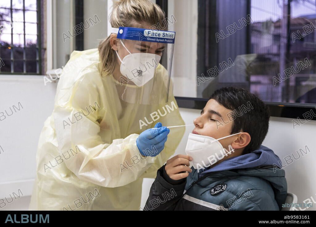 antigen test on a child, Palma, Mallorca, Balearic Islands, Spain.