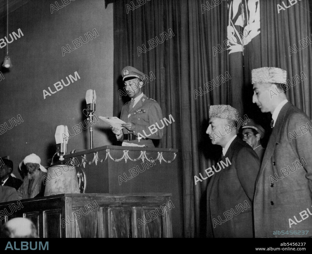Afghans To Claim Pakistan Territory - King Zahir Shaw addresses the opening session of the grand Assembly. second from right is prince Mohammed Daud, Premier and strong man of Afghanistan. At right is deputy Premier Mohammed Naim, who is also foreign minister. Both are members of the Royal family. King Zahir Shaw has ruled Afghanistan since the Assassination of his father in 1933. Afghanistan's "Grand Assembly" (Loe Jirgeh), Which meets only on important Occasions, was convened by king Zahir Shaw in Kabul on November 13 to Discuss the plan for claiming a slice of Territory from Pakistan. The last time the grand assembly was convened was during world war two, when it decided Afghanistan would remain Neutral.More than 1,000 members are attending the assembly, which may last for weeks. Some of those attending the meetings, held in the spacious foreign ministry hall, represent tribes in the northwest frontier area within Pakistan. November 21, 1955. (Photo by Associated Press Photo).