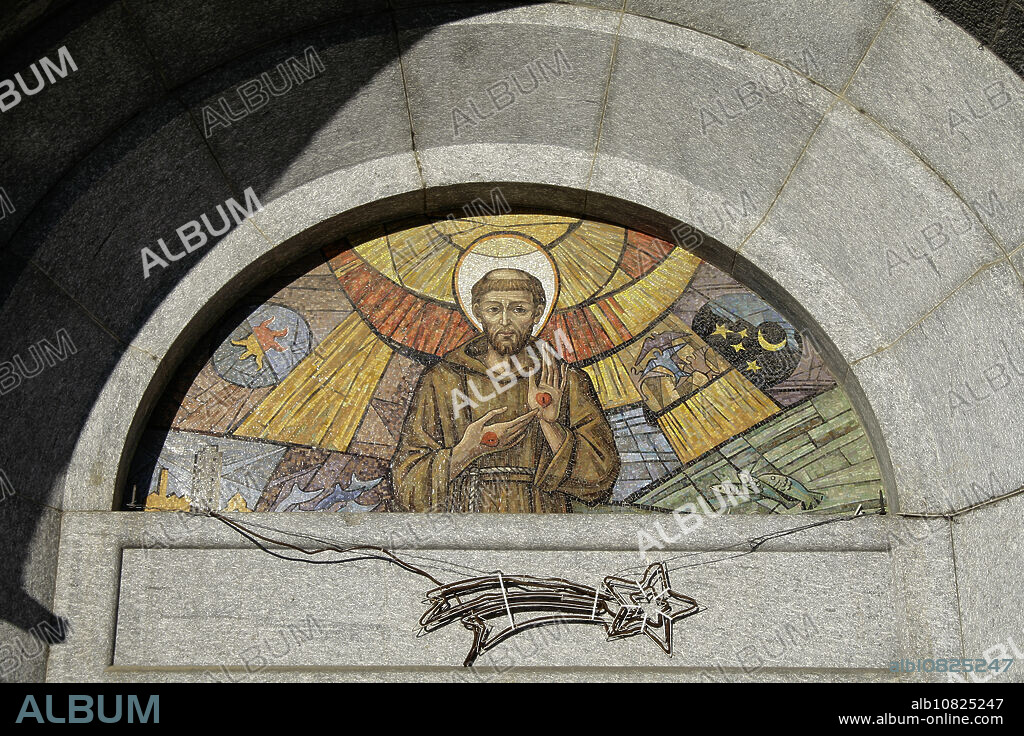 Varese, Lombardy, Italy. Church of St. Francis of Assisi, of the Capuchin Friars, in the structure there is also a monastery. Fresco on the lunette above the entrance door depicting Saint Francis of Assisi showing the stigmata.