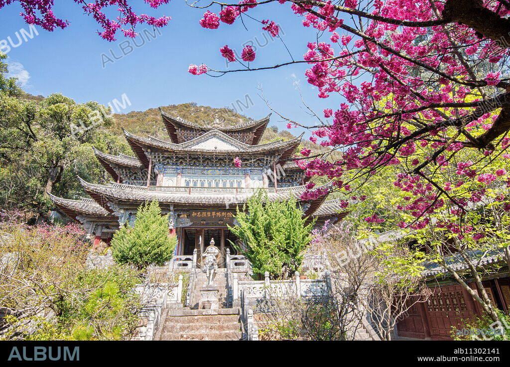 Fu Guo Temple, Five Phoenix Building (formerly Buddhist Cloud Building) in spring, Lijiang, Yunnan, China, Asia.
