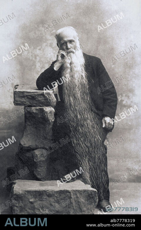 RECORD BEARD A photographic portrait of a fisherman from Ornovasso (Novara), nicknamed Ronchett, famous in the district for having "the longest beard in Italy". The white honor of the chin measured 160 cm, so much so that it almost reached his feet. Italy, around 1900.