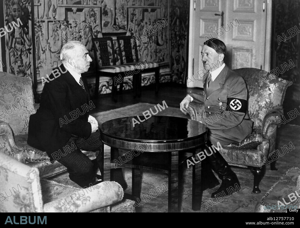 Adolf Hitler informs Czech President Emil Hacha of the imminent German invasion of Czechoslovakia on March 15, 1939 in Berlin. Hacha suffered a heart attack during the meeting, and had to be kept awake by medical staff, eventually giving in and accepting Hitler's surrender terms.